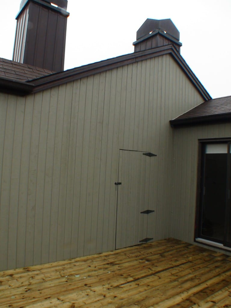 toiture élastomère, revêtement de maibec et construction de terrasse