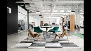 Espace de travail moderne et lumineux chez A+ avec mobilier contemporain.