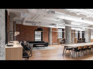 Bureau coworking lumineux avec espace ouvert, mobilier moderne et ambiance conviviale.